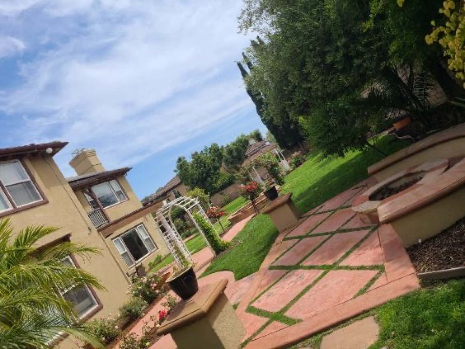 Red-tile walkway with grass inlay detail